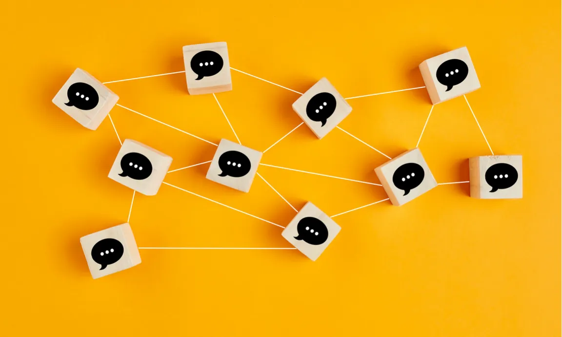 Blocks with communication bubbles, connected with a string