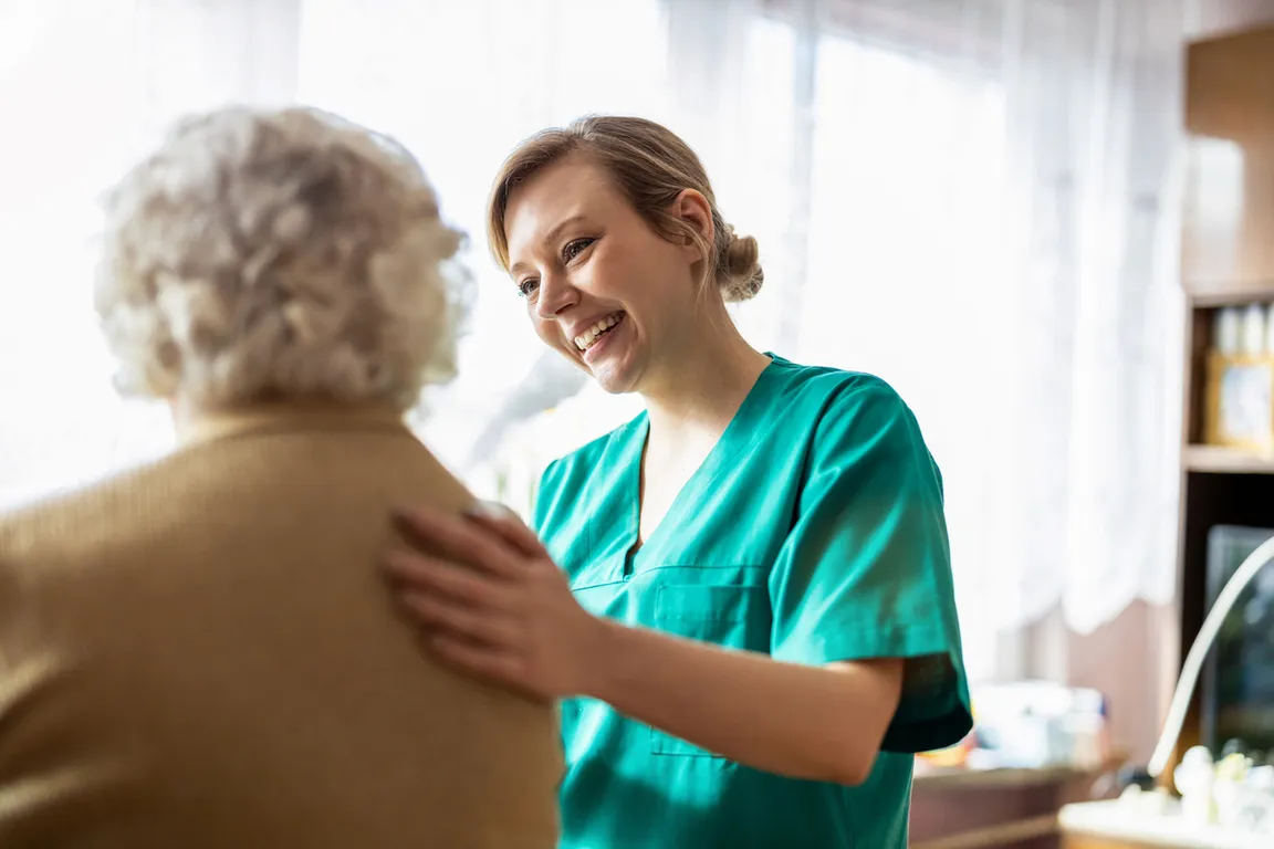 Clinician providing care to a patient living with dementia