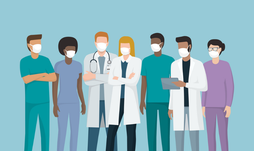 Graphic image of clinical team with masks talking to eachother_840x500.png