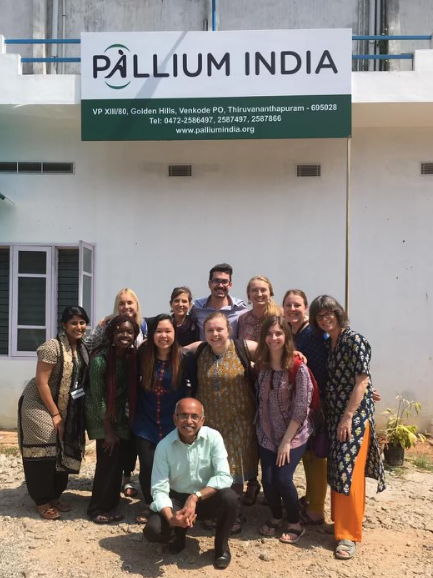 Pallium India group photo taken outside of a Pallium India clinic in Trivandrum