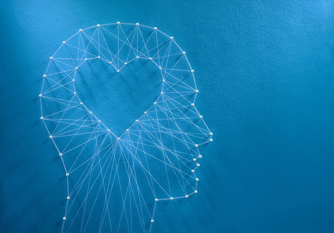 Profile of Human Head with Heart in Center Symbolizing Emotional PPE